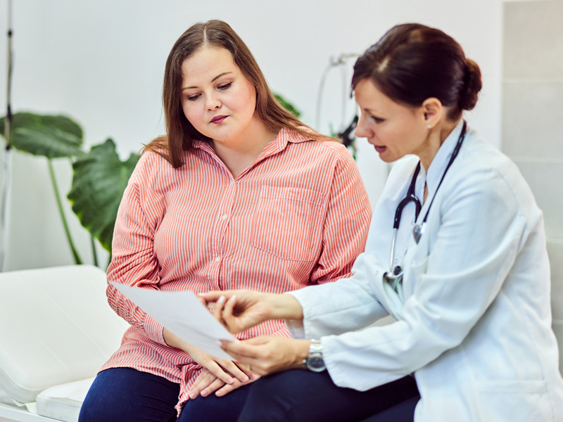 doctor reviewing test results with patient