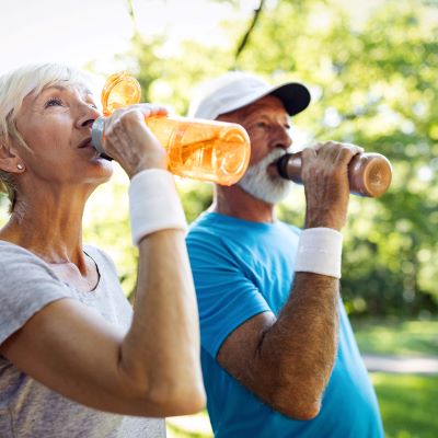 Man and woman drinking water