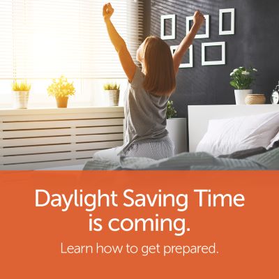 Person stretching in bed