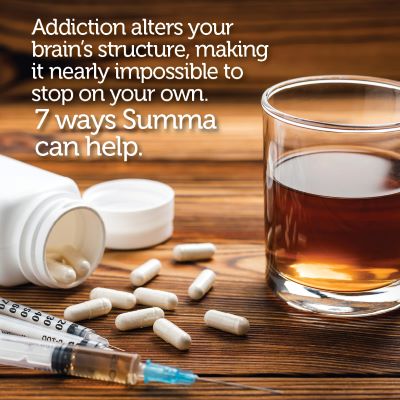 Pile of pills and drink glass