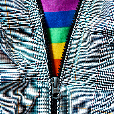Jacket unzipped revealing a rainbow